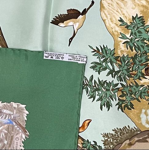 Close up Picture of caretag on used Hermes scarf for sale Sichuan by Robert Dallet from 1995